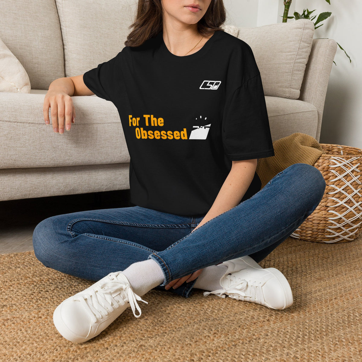 For The Obsessed t-shirt, Black, worn seated on floor